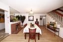 Blue Skies of Oceanside - Fireplace And Dining Area