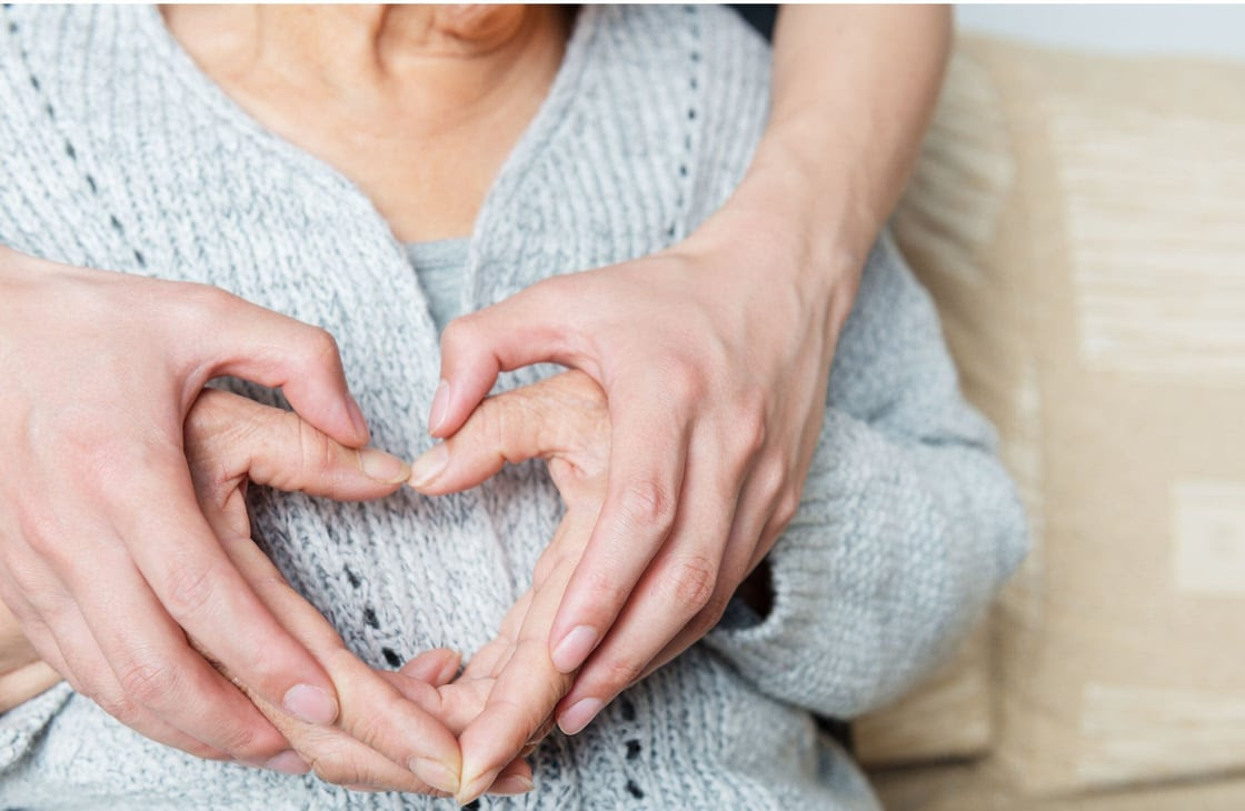 Heart with hands