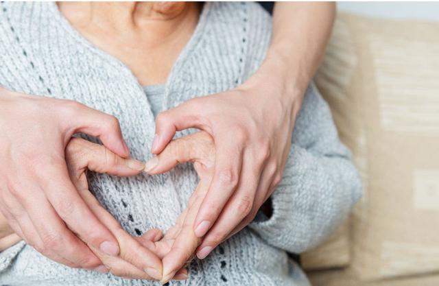 Heart with hands